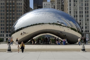 "Cloud Gate" (2006), colloquially known as "The Bean," is Anish Kapoor's iconic sculpture in Chicago's Millennium Park. This polished, stainless steel, bean-shaped structure reflects the city's skyline and visitors, blurring the lines between art and environment. It's a symbol of Chicago's modernity and Kapoor's exploration of form, surface, and urban interactivity.cloud gate